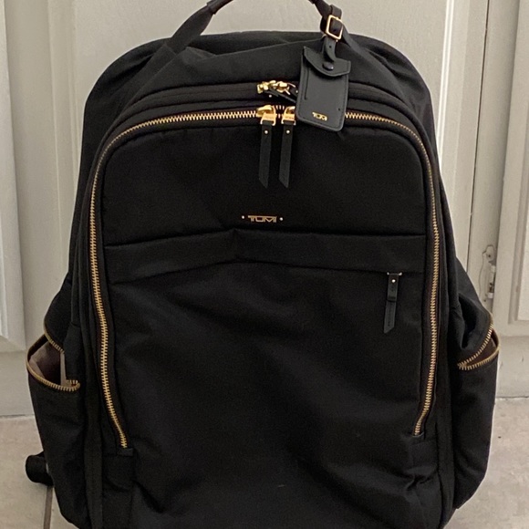 tumi roller backpack